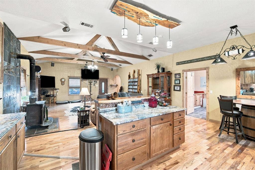 Kitchen island is open to the living area with lots of storage