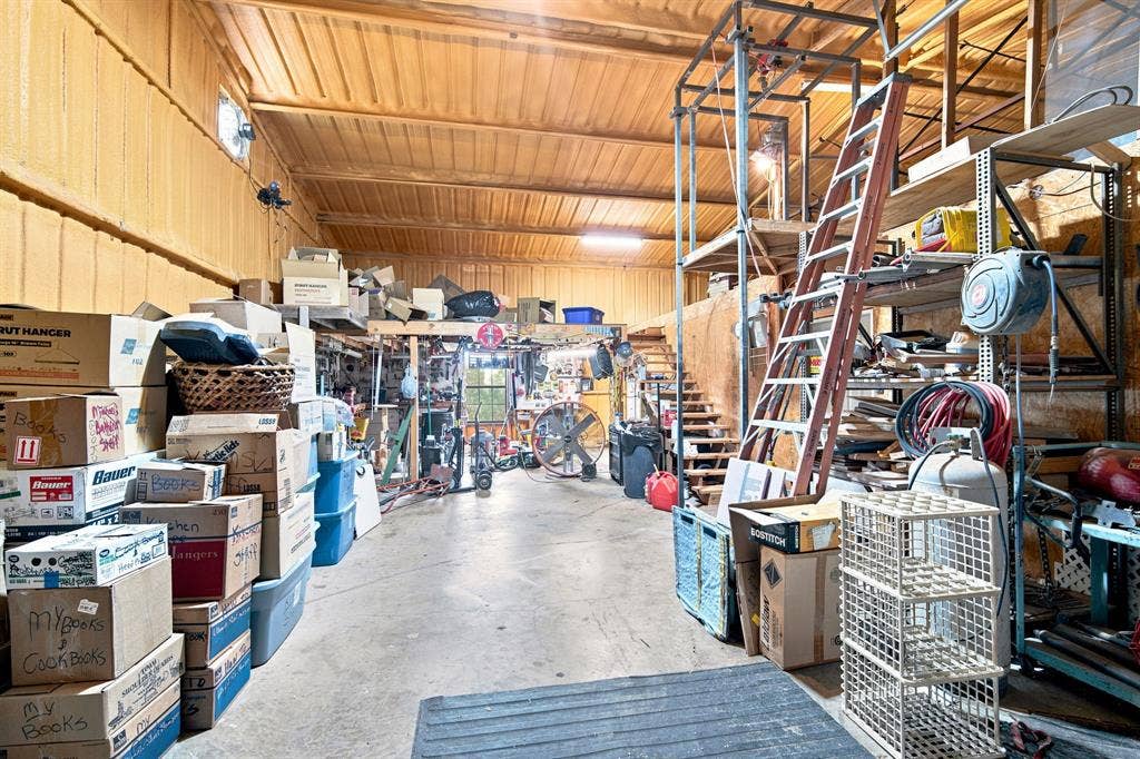40' X 20' workshop-garage with electric. Complete with a lift  and stairs to get to the loft areas