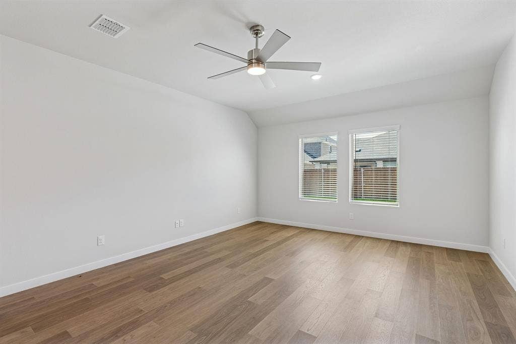 2022 Chariot Court, Seagoville, TX 75159 Living Room in the Harrison home plan by Trophy Signature Homes – REPRESENTATIVE PHOTO
