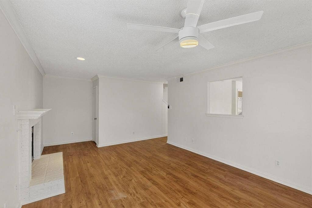 5322 Columbia Avenue, Dallas, TX 75214 Living Room with a fireplace and ceiling fan