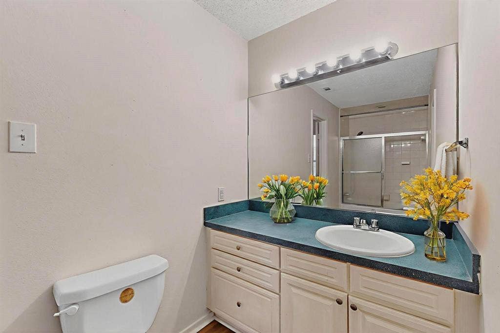 5322 Columbia Avenue, Dallas, TX 75214 Digitally staged photo of bathroom