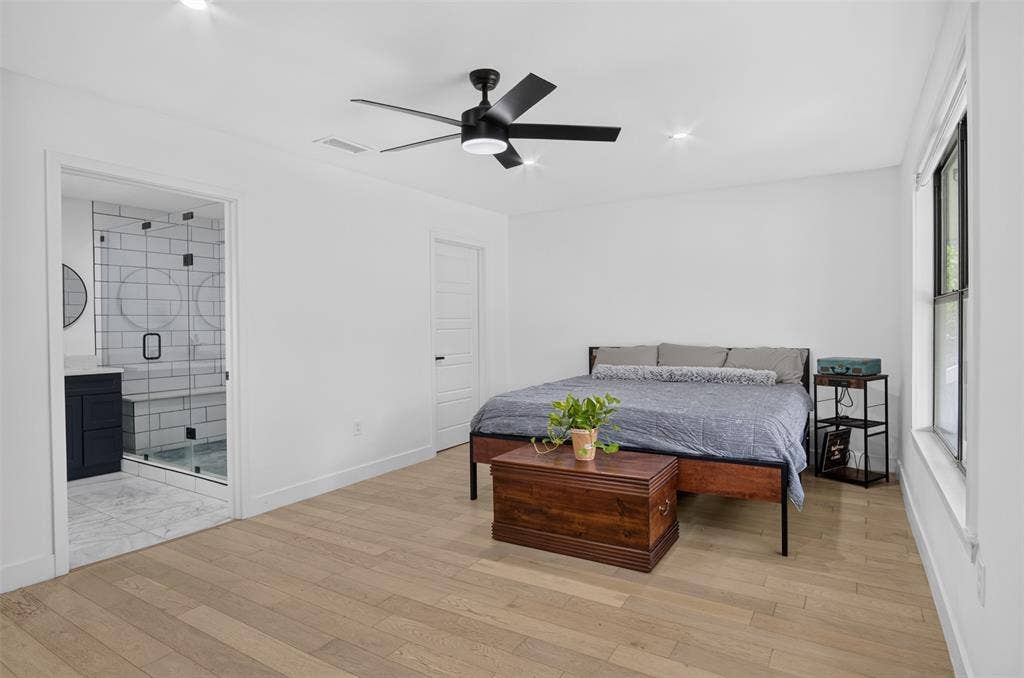 4064 High Summit Drive, Dallas, TX 75244 Primary bedroom with large luxury bathroom.