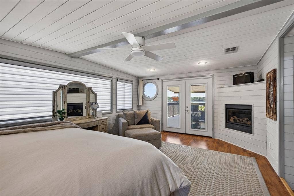 18251 Rocky Point Run, Mabank, TX 75156 The primary suite is complete with birds eye lake views as well as a cozy fireplace for winter!