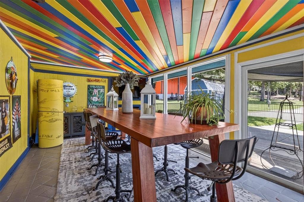 18251 Rocky Point Run, Mabank, TX 75156 This fun sun room space is versatile but currently used as a formal dining for gatherings.
