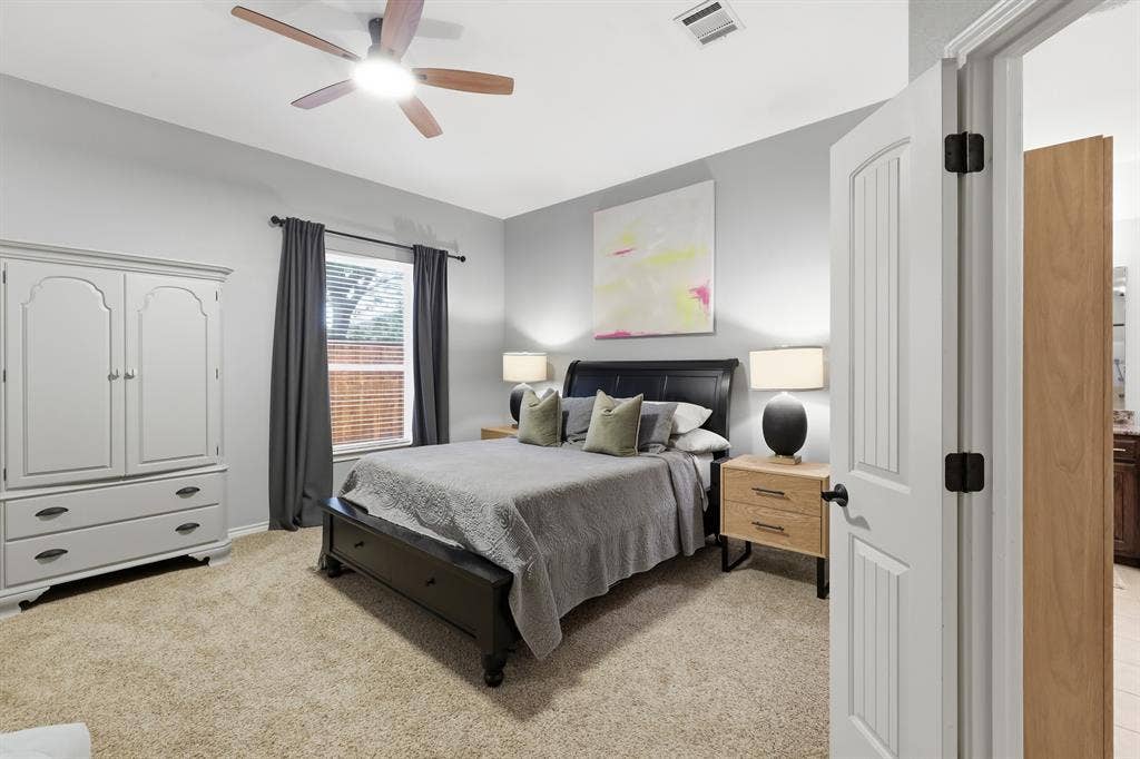 8040 Branch Hollow Trail, Fort Worth, TX 76123 Oversized primary bedroom with fireplace.
