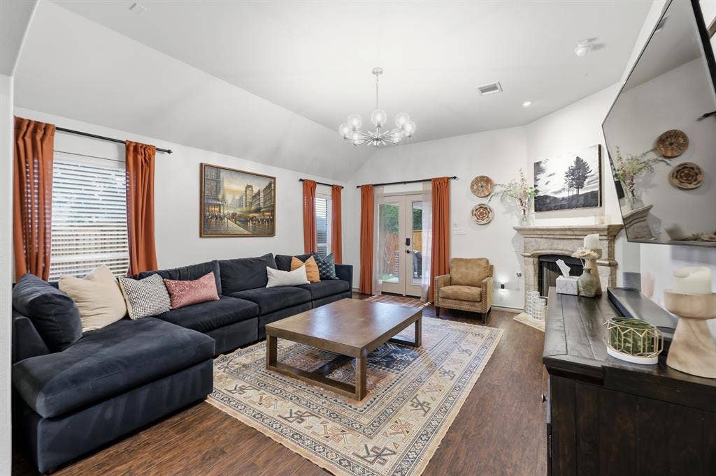 8040 Branch Hollow Trail, Fort Worth, TX 76123 Open living room with backyard and sideyard views.