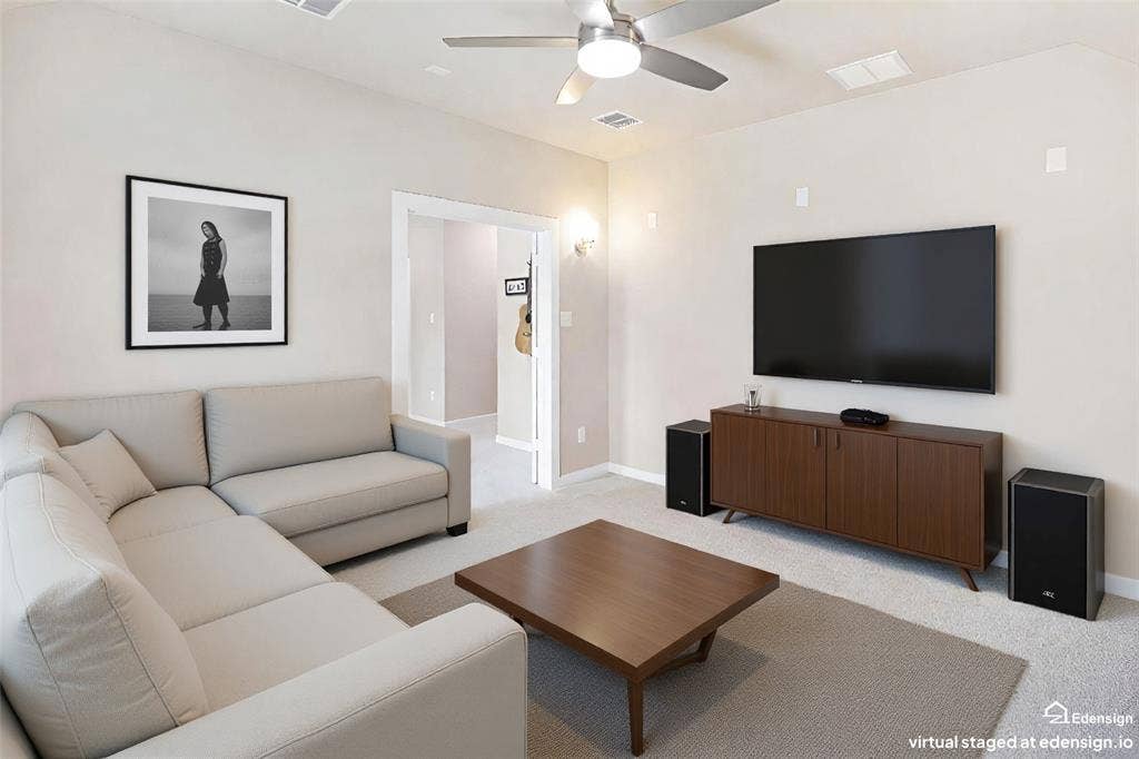 919 Edgehurst Drive, Princeton, TX 75071 Neutral-toned walls complement the carpeted flooring