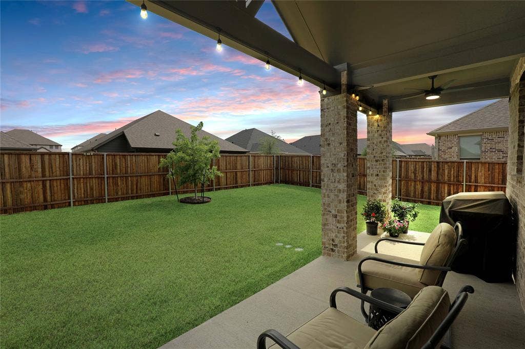 919 Edgehurst Drive, Princeton, TX 75071 Covered patio with brick columns, recessed lighting, and a ceiling fan