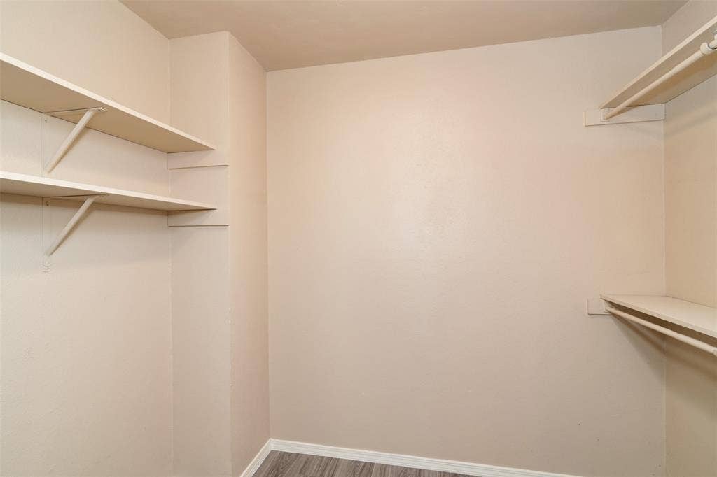 2521 Liberty Lane, Denton, TX 76209 Walk-in closet in primary bedroom