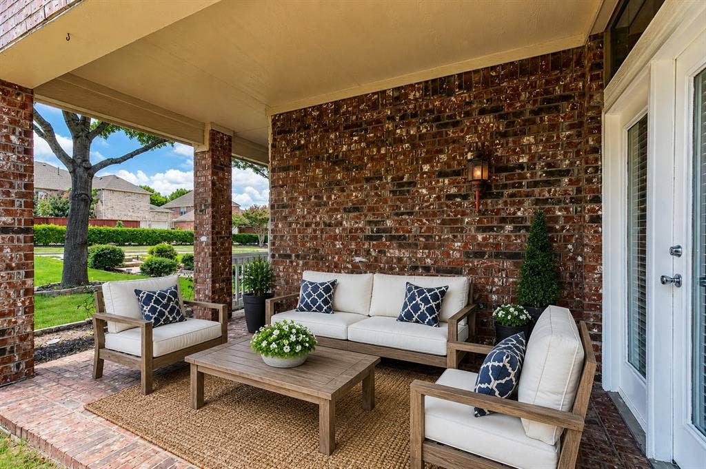 11020 Coralberry Drive, Frisco, TX 75033 wrap around side patio with secondary bedroom access - virtually staged