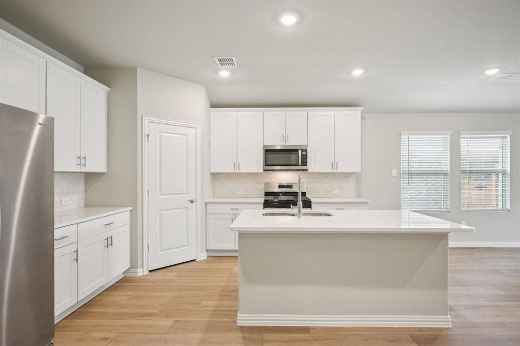3405 Richmond Drive, Farmersville, TX 75442 Photo is not of the actual home, but is an inspirational photo of builder’s model home and may depict options, furnishings, and/or decorator features that are not included.