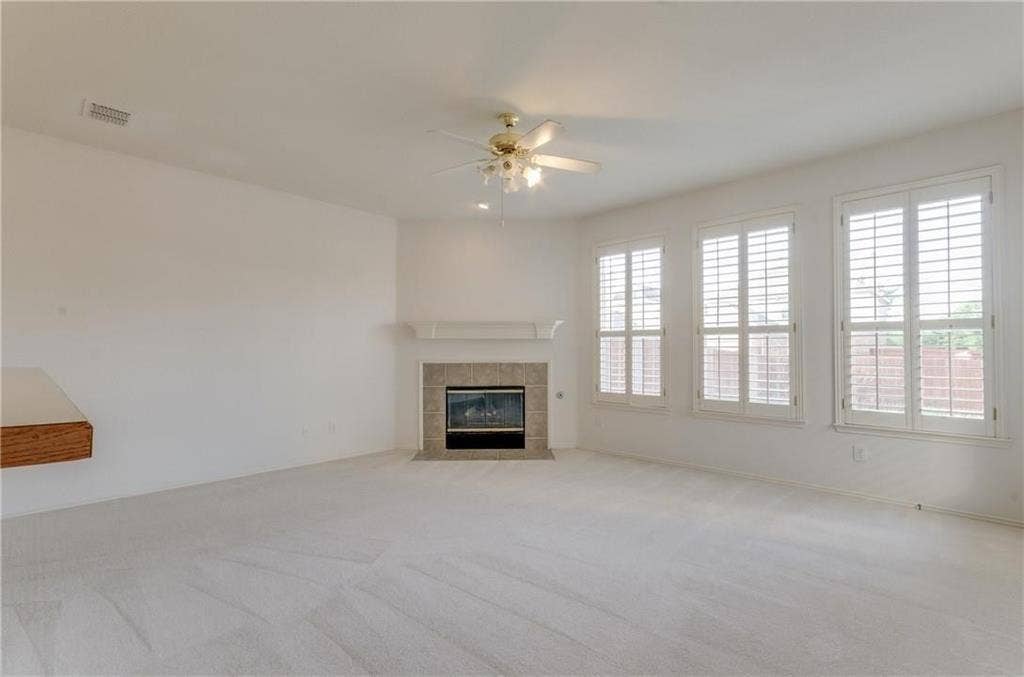 4440 Waskom Drive, Plano, TX 75024 Spacious room featuring light-toned carpeting and a ceiling fan