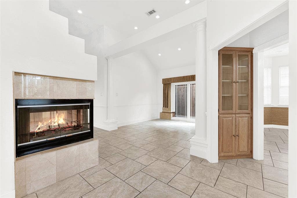 Act as a luxury real estate marketing expert and lifestyle storyteller. Analyze these images of a kitchen  and provide exactly two descriptive sentences about each photo, no more than 50 words total. Provide different details about each photo, even though they are the same room, just different angles. Do not repeat details. Disregard any furniture or added accessories in the room. Keep track of the previous descriptions of rooms in this chat and do not repeat phrases.Sentence 1: Focus on the architectural soul. Describe the most striking physical feature and how it interacts with light or space.Sentence 2: Focus on the emotional experience. Help a buyer visualize a specific moment of daily life in this room (e.g., a quiet morning coffee, hosting an elegant dinner, or a relaxing evening retreat).Tone: casual, friendly, inviting, and evocative. Avoid real estate clichés like "stunning" or "must-see."