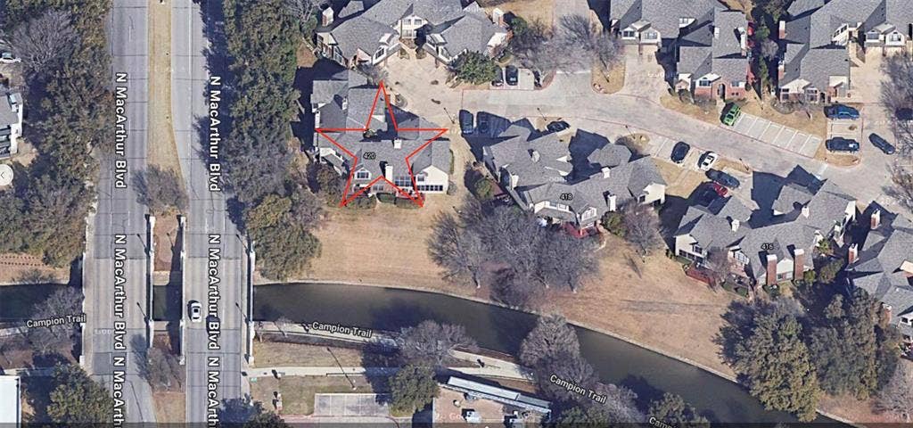 Aerial Property View. Illustrating the property's perimeter within its immediate environment