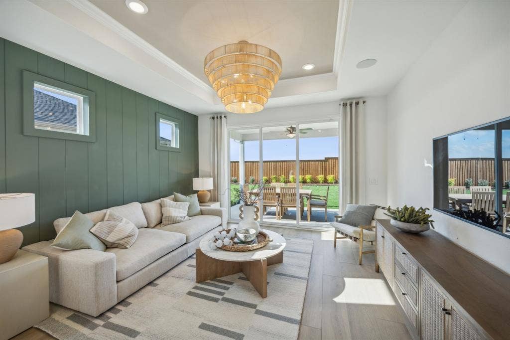 305 Snowbird Way, McKinney, TX 75071 *Model Representation - Spacious gathering room with large windows