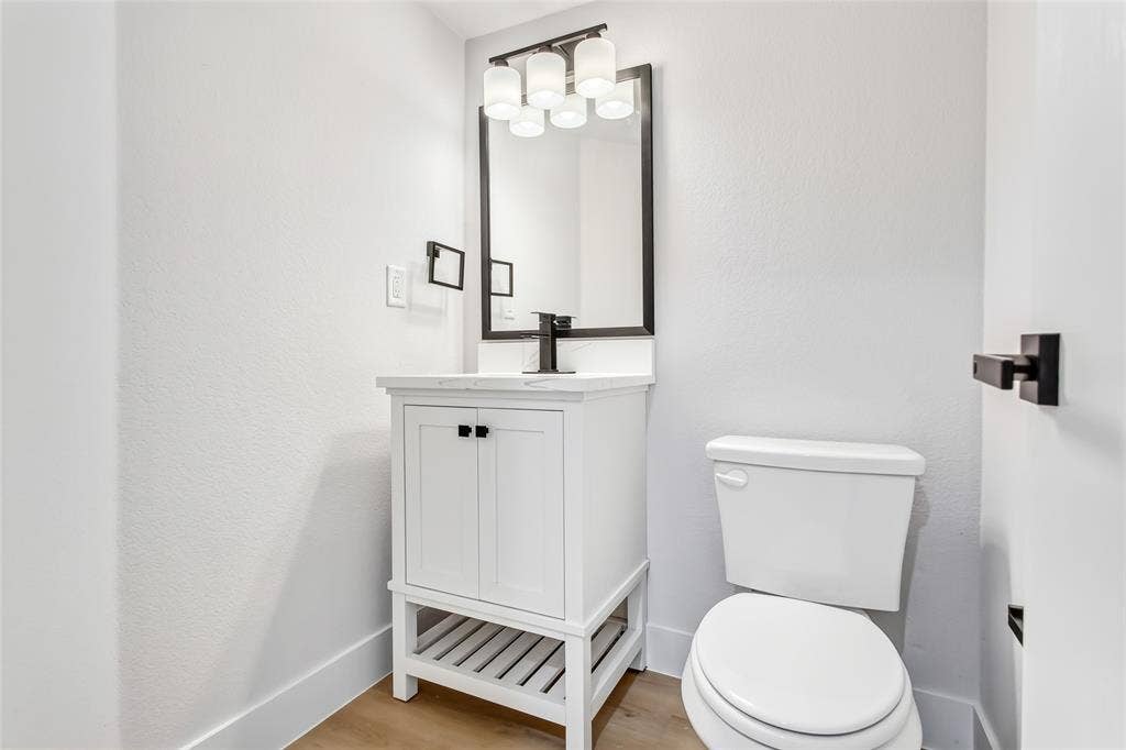 3615 Rio Blanco Drive, Dallas, TX 75227 Downstairs half bath for guests.