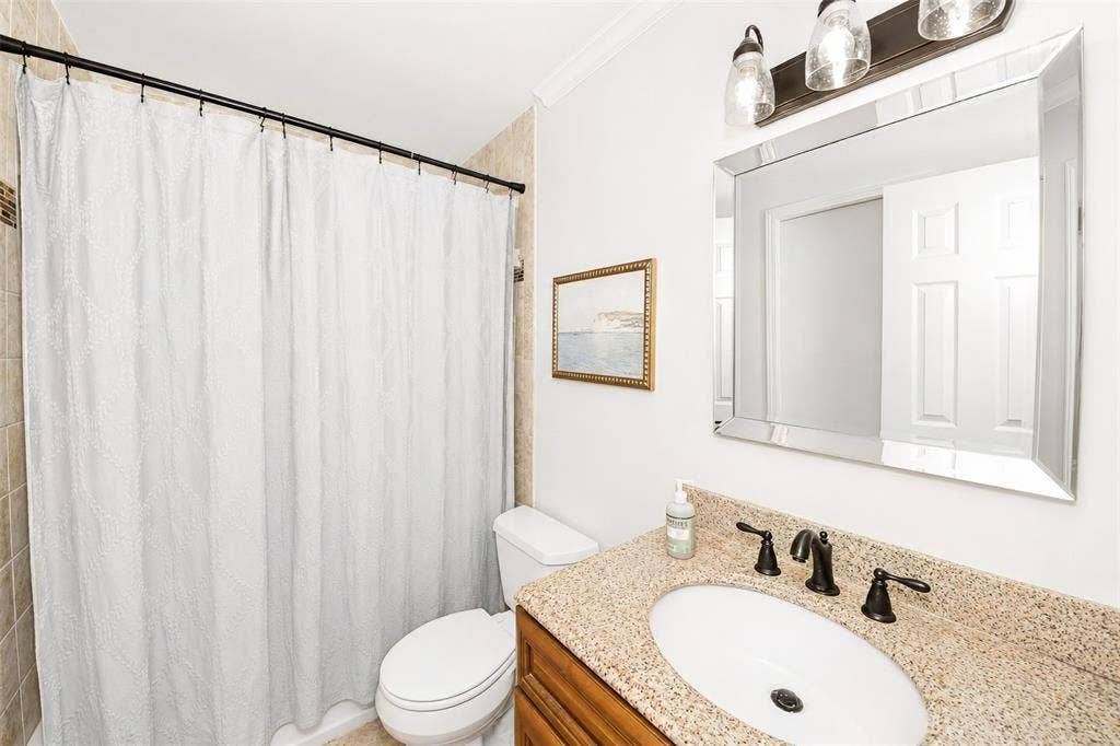 1119 Normandy Drive, Grapevine, TX 76051 Guest bath with linen closet.