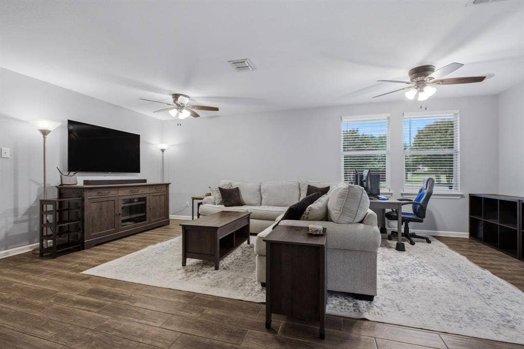12932 Pearson Drive, Frisco, TX 75035 Extended living room with beautiful natural light.