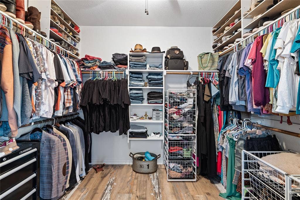 12012 Tobosa Circle, McKinney, TX 75071 Spacious closet with light wood-type flooring