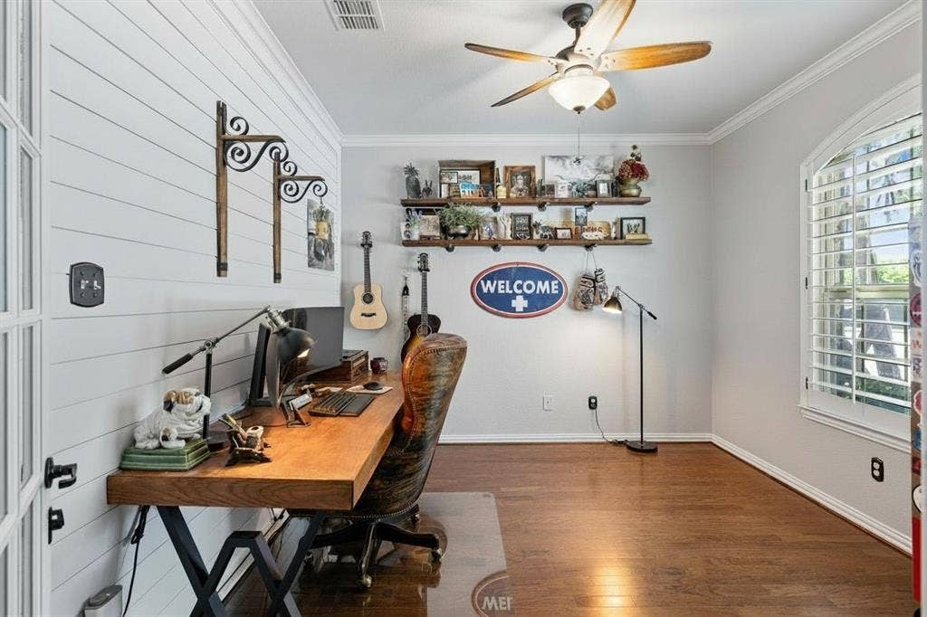 12012 Tobosa Circle, McKinney, TX 75071 Dedicated workspace featuring a shiplap accent wall and wood-finish flooring