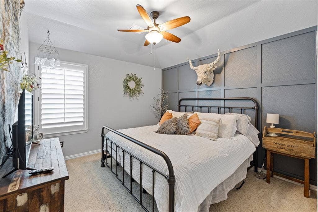 12012 Tobosa Circle, McKinney, TX 75071 Carpeted bedroom with ceiling fan