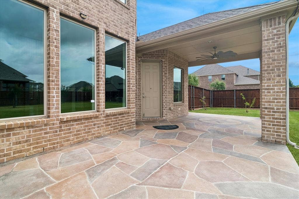 1650 Chisholm Trail, Prosper, TX 75078 Expansive covered patio featuring a flagstone-style finish