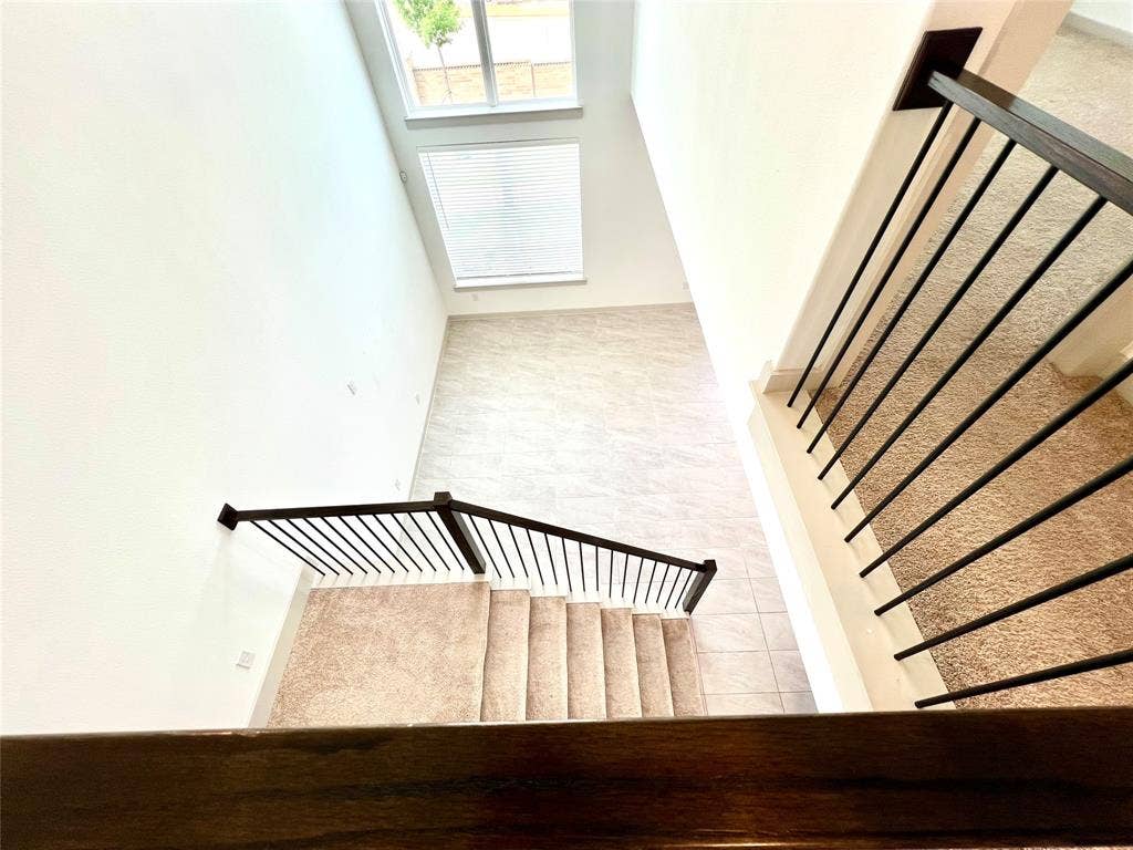 1755 Montgomery Drive, Plano, TX 75075 Staircase featuring tile patterned floors