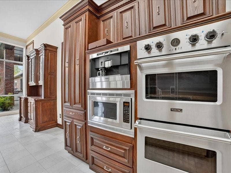 5201 Windjammer Road, Plano, TX 75093 Built-in stainless steel double oven, microwave, and coffee maker