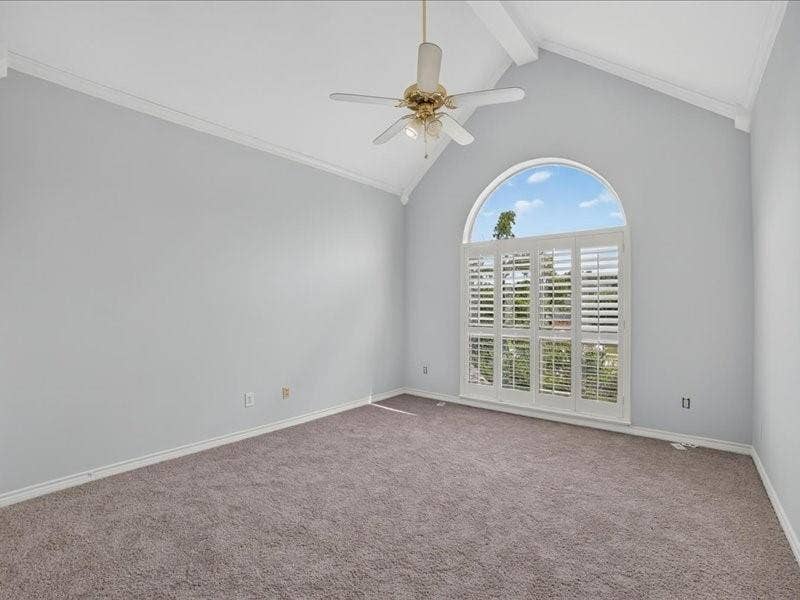 5201 Windjammer Road, Plano, TX 75093 Vaulted ceiling featuring a ceiling fan with integrated lighting