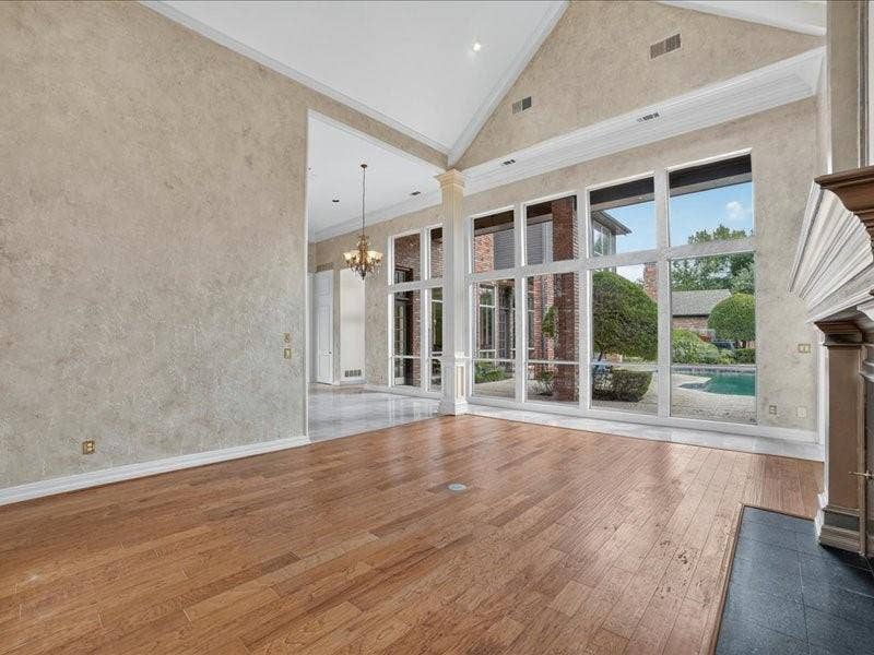 5201 Windjammer Road, Plano, TX 75093 Vaulted ceiling great room with wood-finish flooring