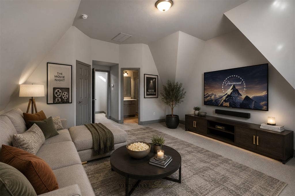 Upstairs space staged as a media room/living space