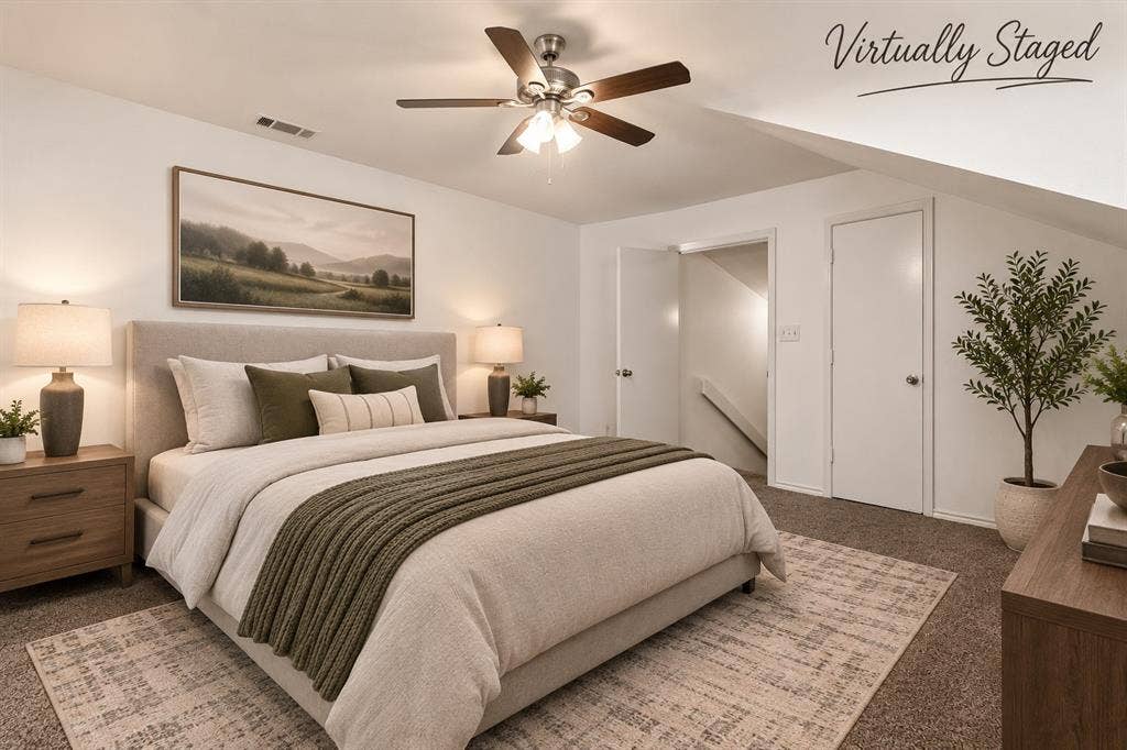 3318 Wells Drive, Plano, TX 75093 Carpeted room featuring a ceiling fan with integrated lighting, a white painted wall, and two white doors