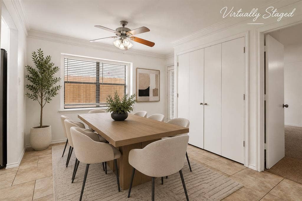 3318 Wells Drive, Plano, TX 75093 Dining area featuring tile flooring, a ceiling fan with light fixture, a window with blinds, and built-in bifold doors