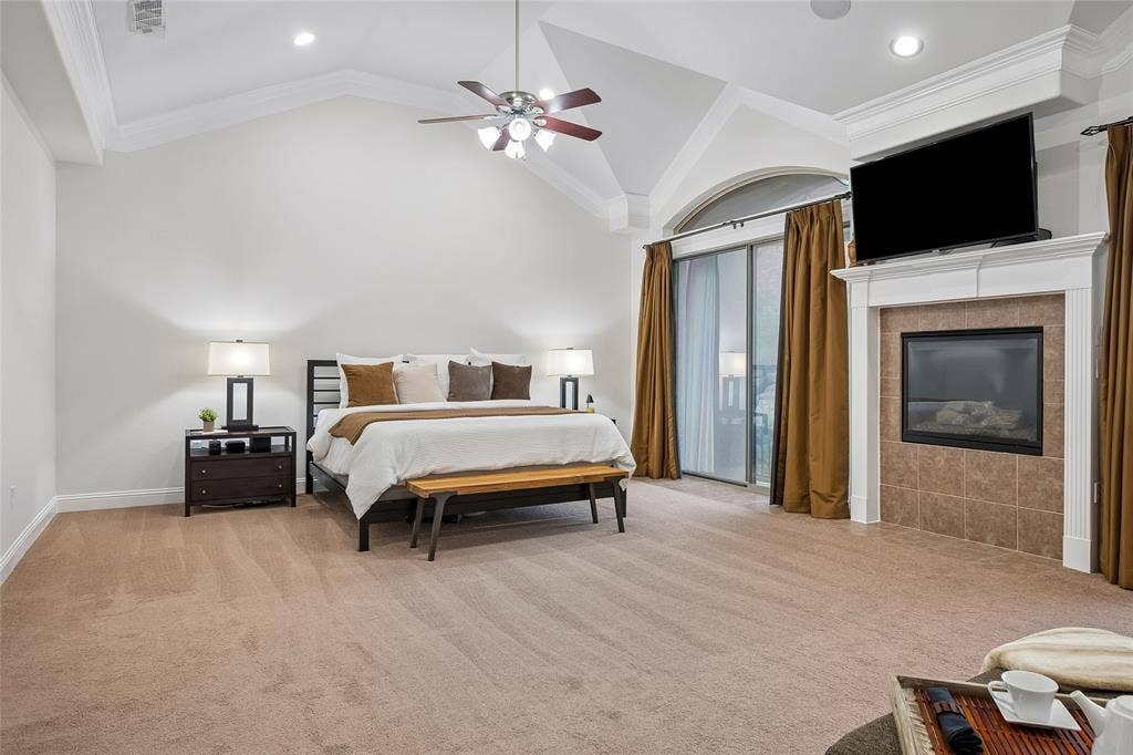 The home's second fireplace warms the room in cool weather.