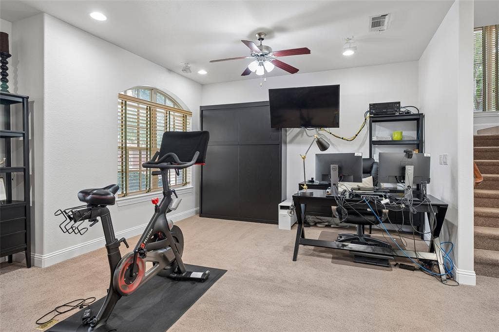 This versatile room can be a gym, bedroom, or another living space.