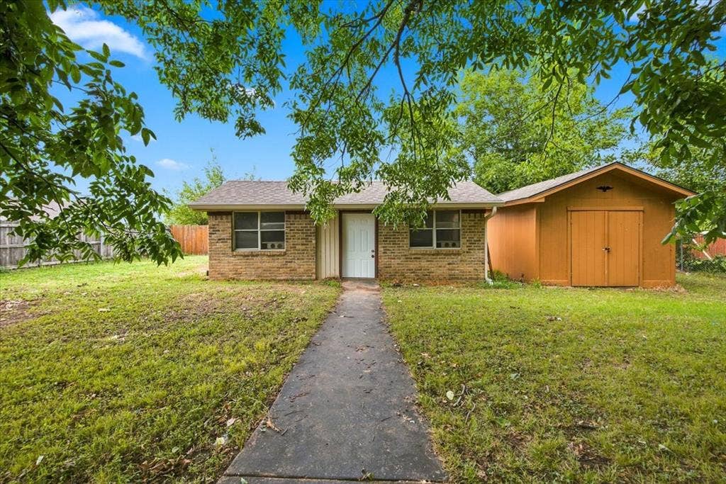 612 W Highland Street, West, TX 76691 Brick he-shed or she-shed with almost endless possibilities with a sizable storage shed next door
