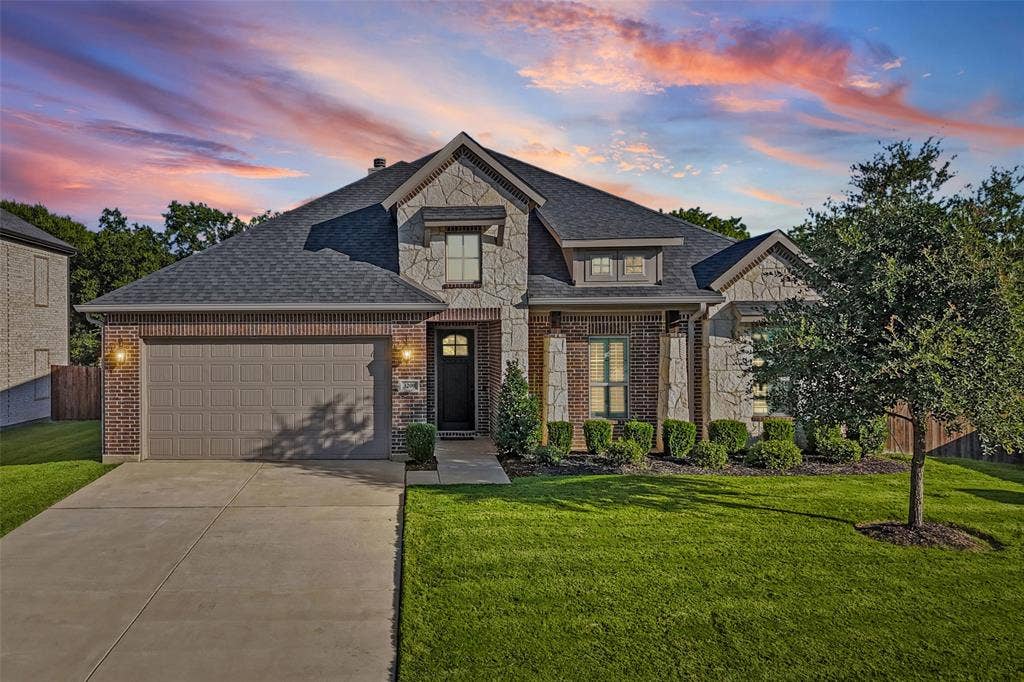 3200 Tail Water Drive, Mansfield, TX 76063 Great curb appeal with only one next door neighbor and green space behind