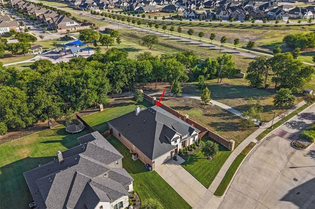 3200 Tail Water Drive, Mansfield, TX 76063 Great curb appeal with only one next door neighbor and green space behind