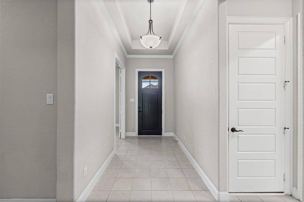 3200 Tail Water Drive, Mansfield, TX 76063 View of the front door and the doorway to the office or 4th bedroom at the front of the home