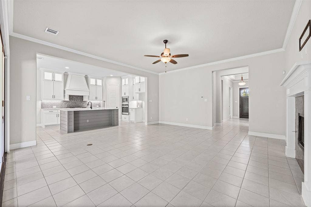 3200 Tail Water Drive, Mansfield, TX 76063 The living room is open to the kitchen