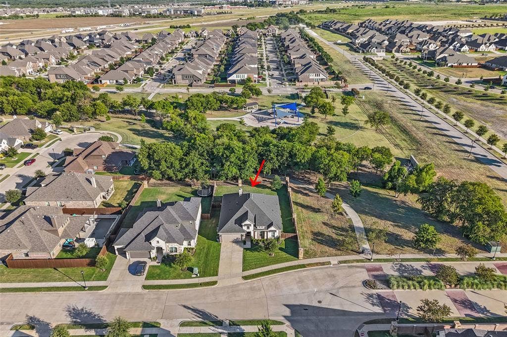 3200 Tail Water Drive, Mansfield, TX 76063 Great curb appeal with only one next door neighbor and green space behind
