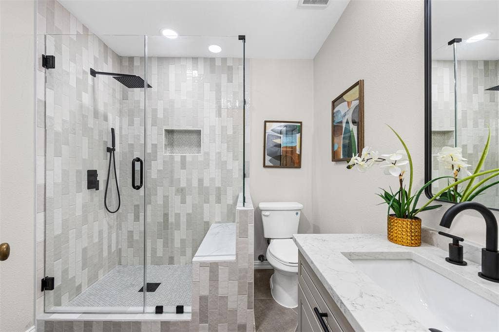 311 N Tennant Street, Dallas, TX 75208 Fully updated bathroom with custom tile shower