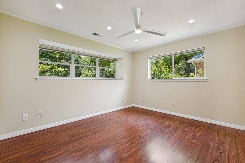 12022 Dixfield Drive, Dallas, TX 75218 Upstairs secondary bedroom with beautiful views.
