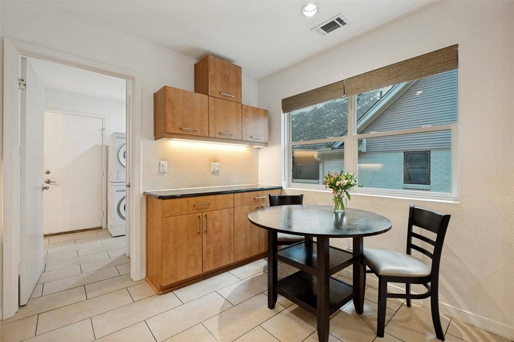 12022 Dixfield Drive, Dallas, TX 75218 Updated kitchen offering a blend of modern finishes and eat in kitchen.