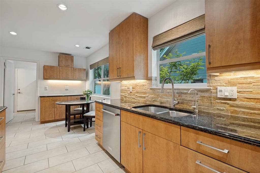 12022 Dixfield Drive, Dallas, TX 75218 Stylishly updated kitchen with a functional layout and contemporary touches.