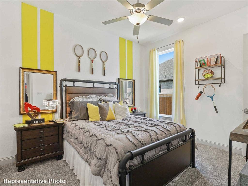 4359 Michigan Avenue, Midlothian, TX 76065 Carpeted bedroom featuring a ceiling fan with integrated lighting, a large window, and recessed lighting