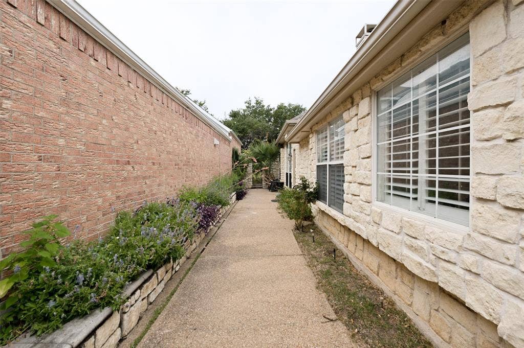 8012 Springmoss Drive, Plano, TX 75025 Beautiful stone accents and smooth side pavement