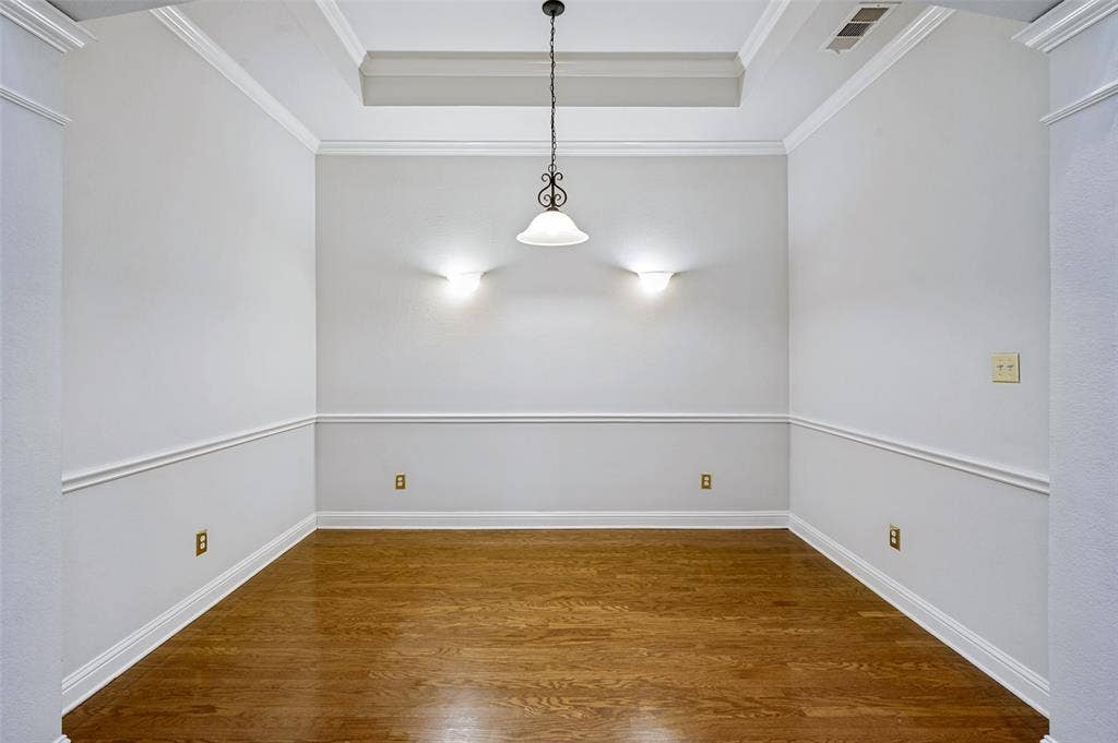8012 Springmoss Drive, Plano, TX 75025 Fresh paint, gorgeous wood floors, accent lighting with wall chair railings