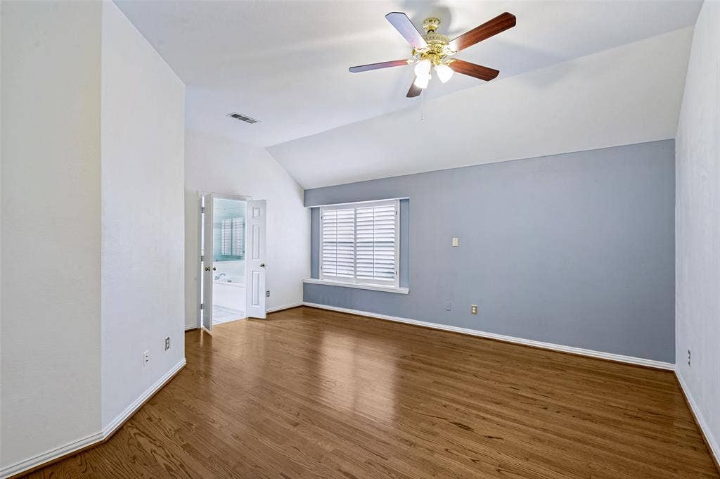 8012 Springmoss Drive, Plano, TX 75025 Tall Ceilings and french doors to bathroom