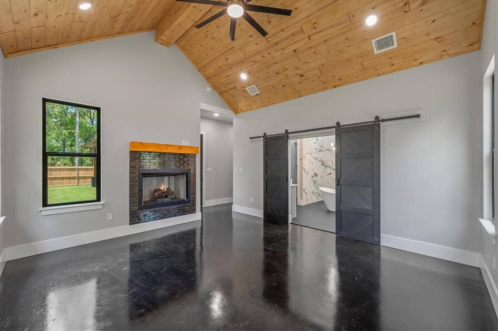 12253 Madison Xing, Bullard, TX 75757 Vaulted wood-plank ceiling with a ceiling fan and recessed lighting